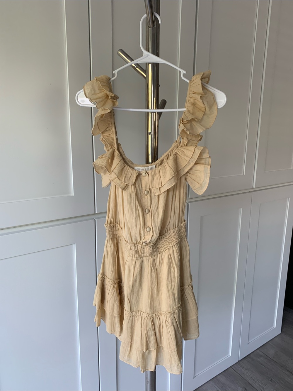 Chelsea & Violet Ruffled Sleeveless Romper in Color Natural, Size XS.